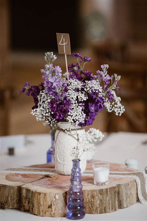 purple floral centerpieces weddings|rustic purple wedding centerpieces.